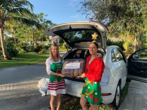 MediationWorks Joanne Luckman and elf spreading holiday cheers