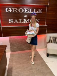 Joanne Luckman at Groelle & Salmon delivering fresh apple pies.