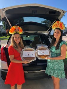 Joanne Luckman and Jena Luckman of MediationWorks delivering pies thanking clients 