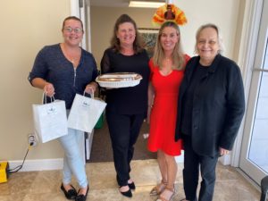 Joanne Luckman of MediationWorks delivering pies to happy clients