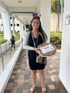  Emily Granofsky holding an apple pie ready for delivery
