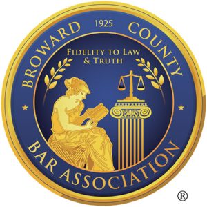 Blue and gold circular logo of the Broward County Bar Association