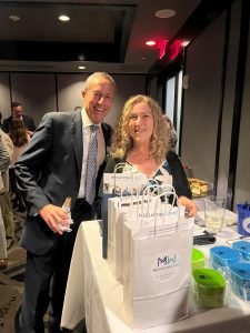 Mediators Andrew Luckman with MediationWorks Giveaway Bag with cool swag at the Broward County Bar