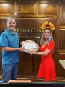 Joanne Luckman of MediationWorks delivering pies to Peterson Bernard