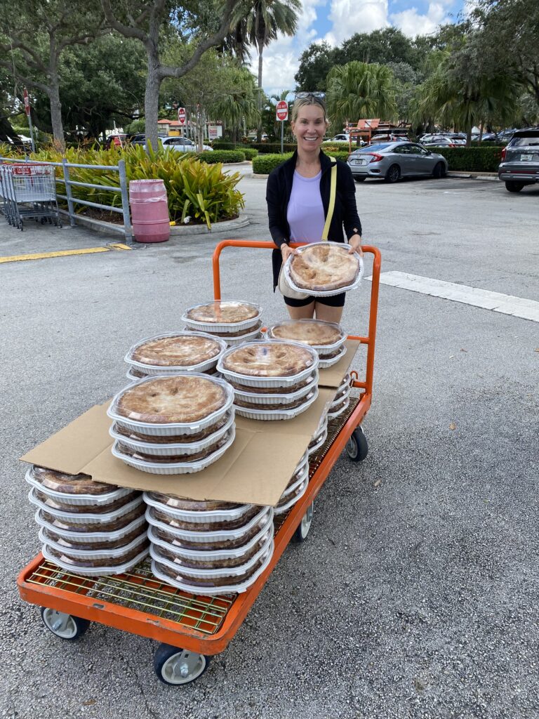 MediationWorks Joanne Luckman with a cart of more than 50 apple pies