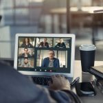 A group of individuals talking and working on a video call.