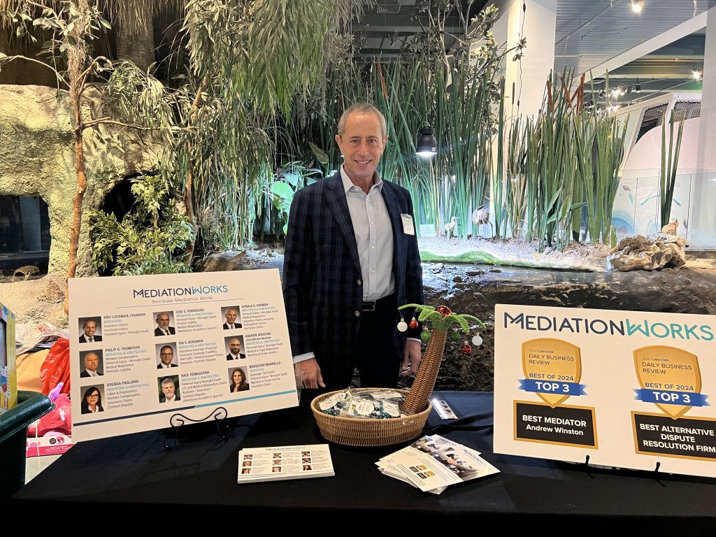 Eric Luckman at BCBA's Annual Holiday Party at MediationWorks booth