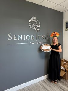 Joanne Luckman at Peterson Bernard delivering holiday pies