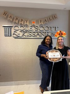 Joanne Luckman delivering pies to Cole, Scott & Kissane PA
