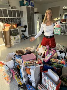 Joanne Luckman with toys for The Soup Kitchen's annual Ho Ho Ho-liday Toy Drive