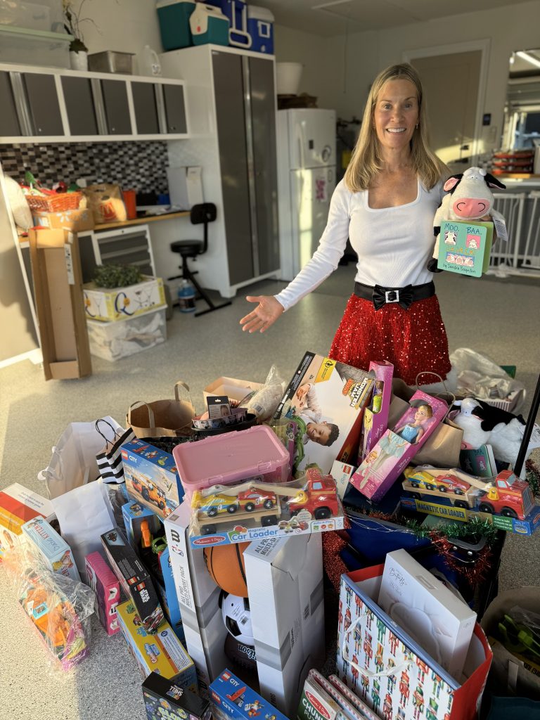 Joanne Luckman with toys for The Soup Kitchen's annual Ho Ho Ho-liday Toy Drive